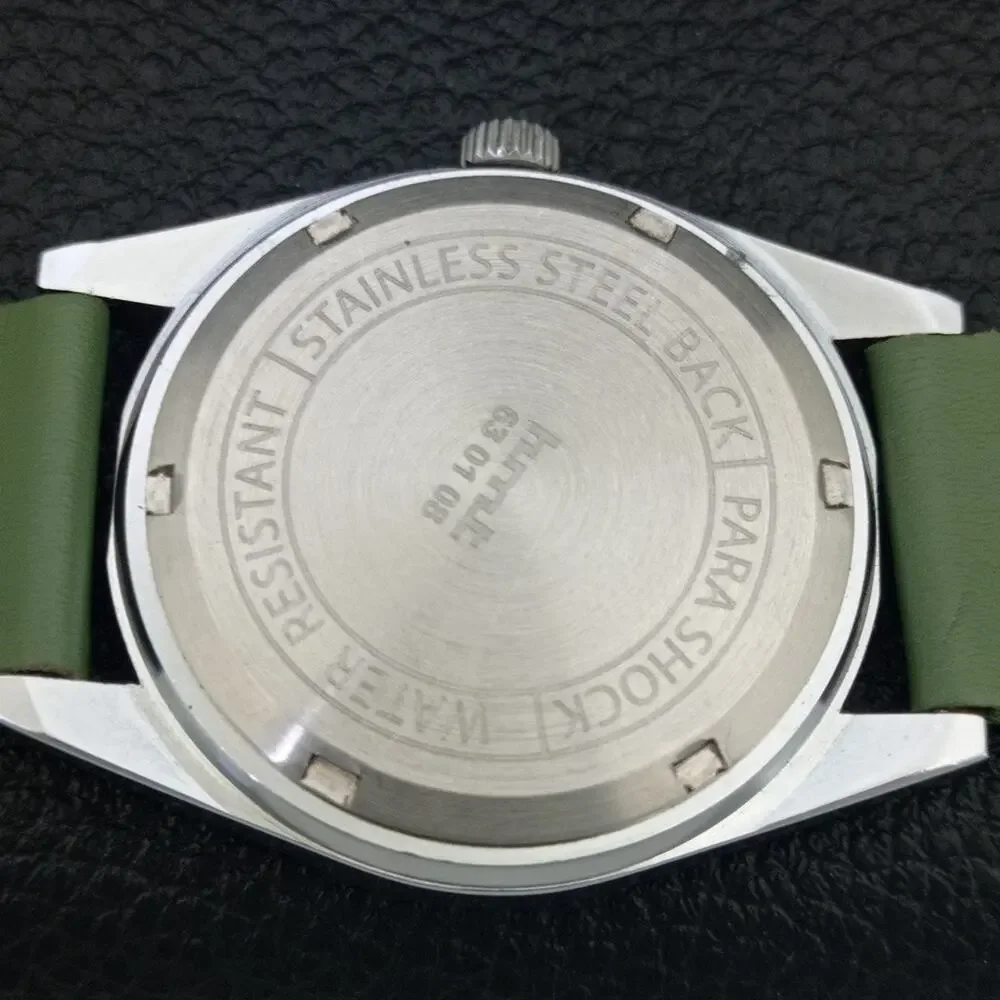 Vintage 1977 HMT Manual Wound Mens Silver Watch & Green accents